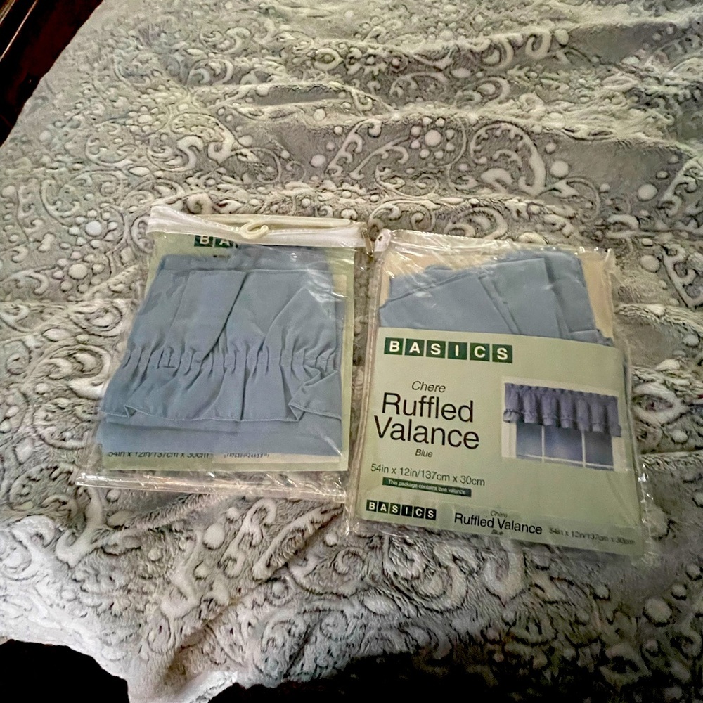 Two ruffled valance curtains